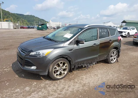 2015 Ford Escape Titanium z USA, uszkodzony, nr VIN 1FMCU9J96FUB11569